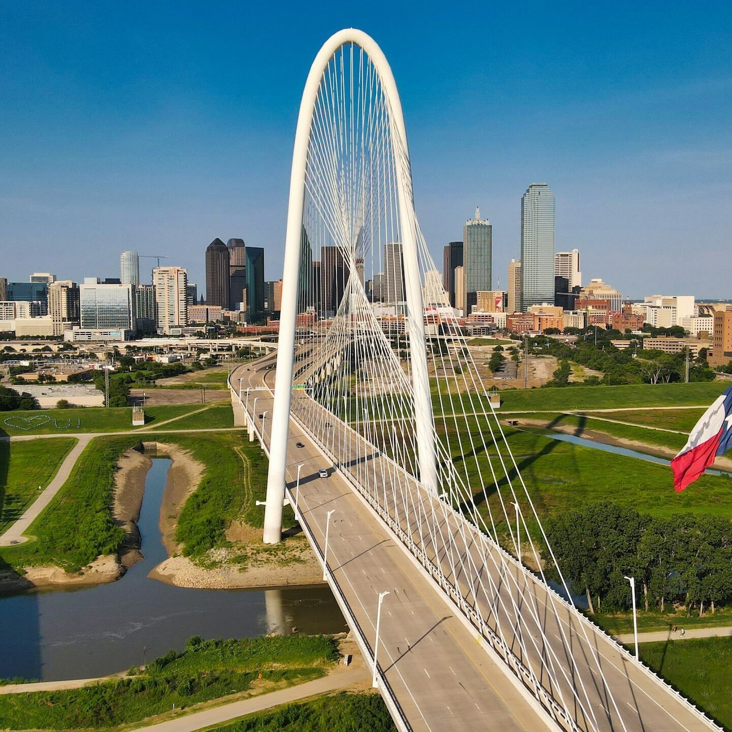 scenic drive Dallas skyline road luxury car